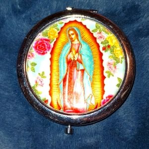 Virgin Mary portrait compact mirror.